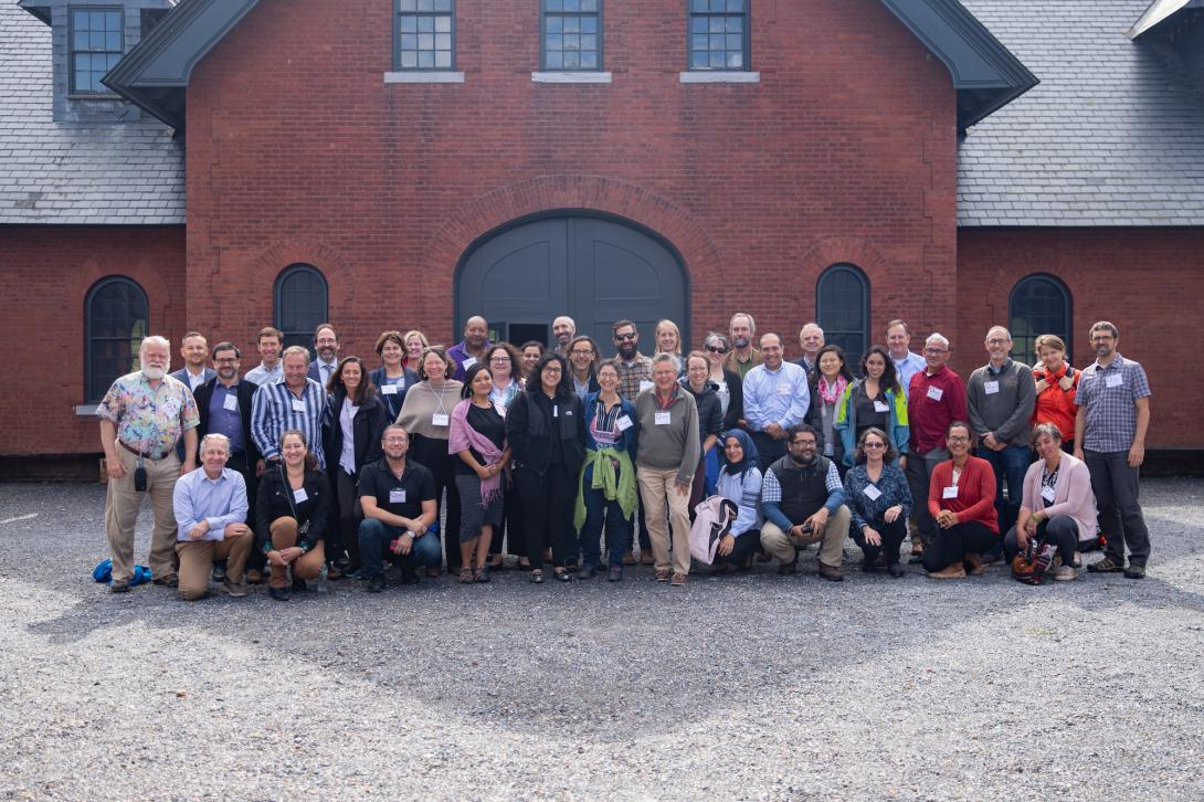 Conference goers pose for group photo